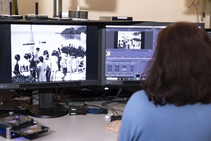 forvideo - filmbearbeitung Am Bildschirm erfolgt die Nachbearbeitung digitalisierter Filme mit hoher Präzision und Blick fürs Detail, um alte Filme und Dias bestmöglich zu erhalten.